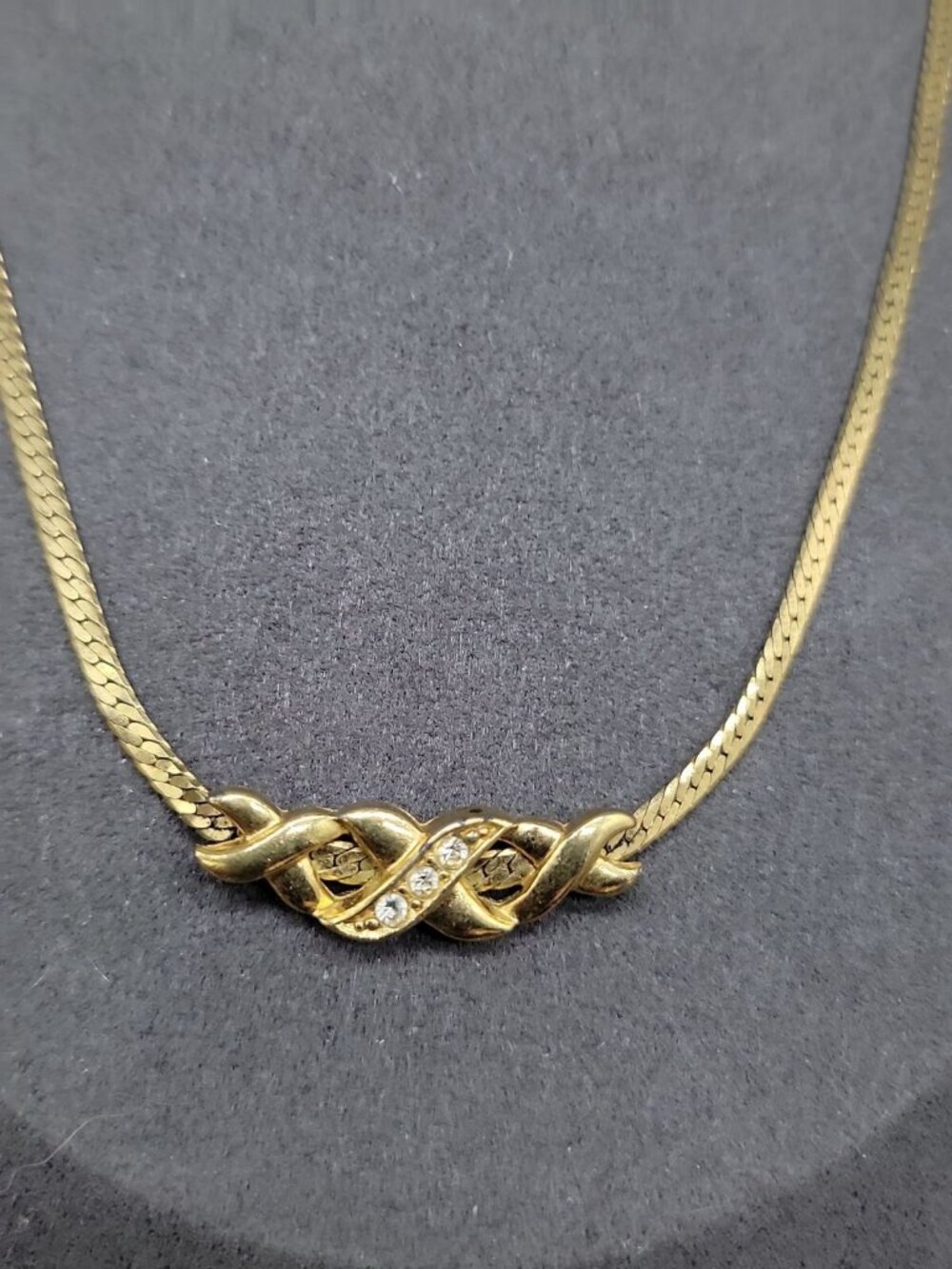 Avon Sparkle Kiss Necklace 17" Gold Tone Twisted X Floating Pendant Rhinestone